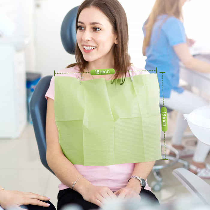JMU Dental 4-Ply Disposable Dental Paper Bib placed on patient’s chest during dental treatment to protect clothing - JMU Dental